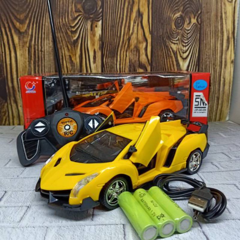 Mobil remote control Lamborghini buka pintu charger modern team