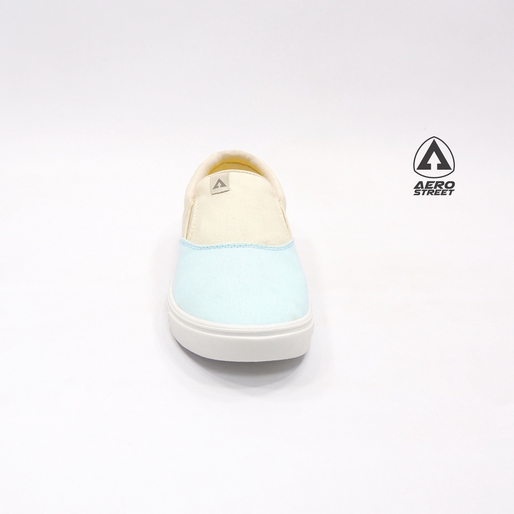 light blue van slip ons