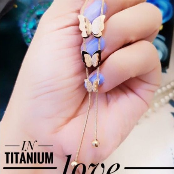 Titanium kalung kupu o9