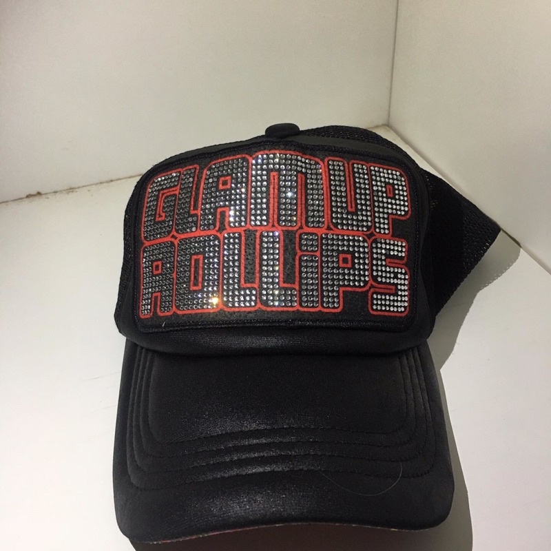 topi trucker second rollips