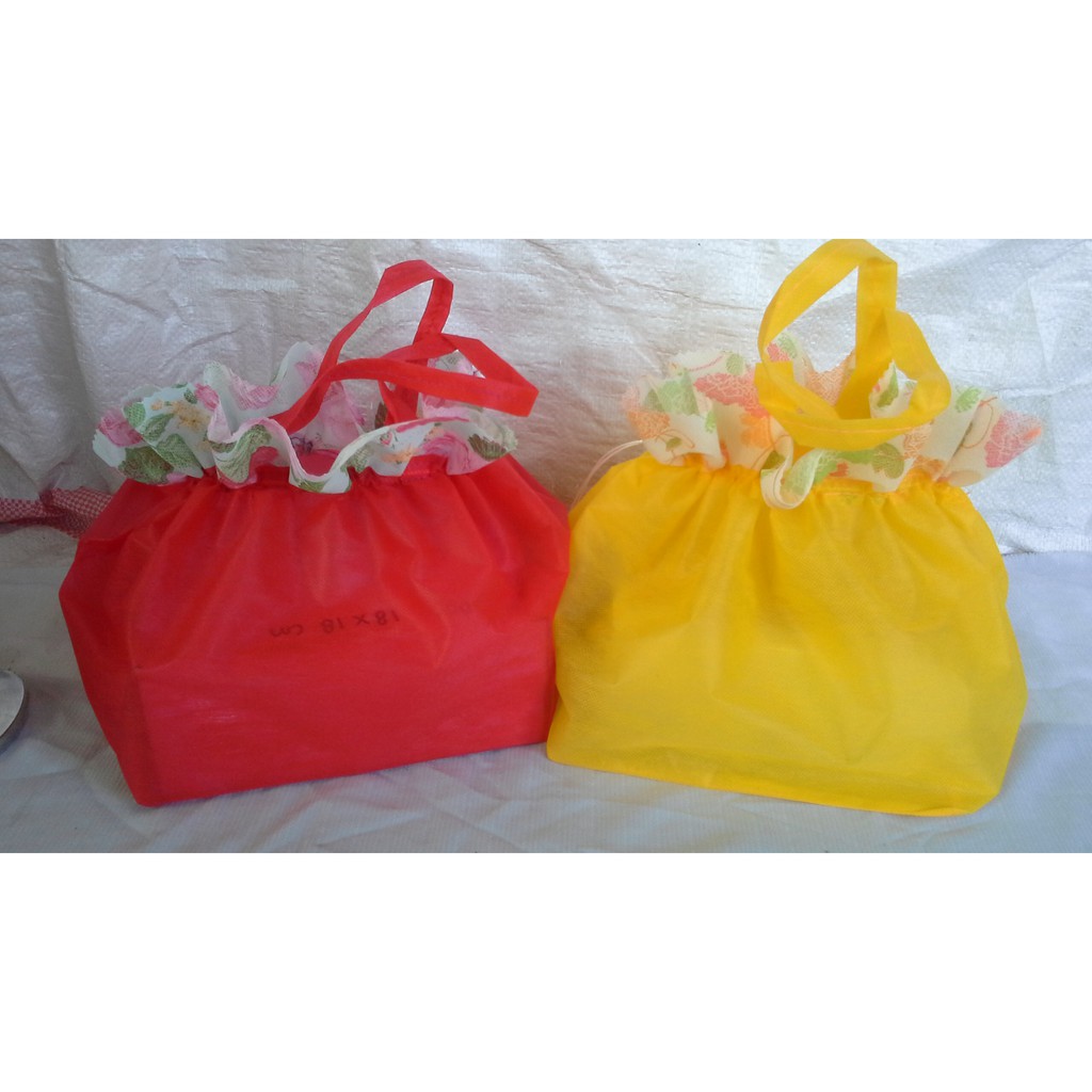 

TAS SERUT TIPIS SPUNBOND ALAS 18X18 GOODIE BAG ULTAH WEDDING HARGA MURAH