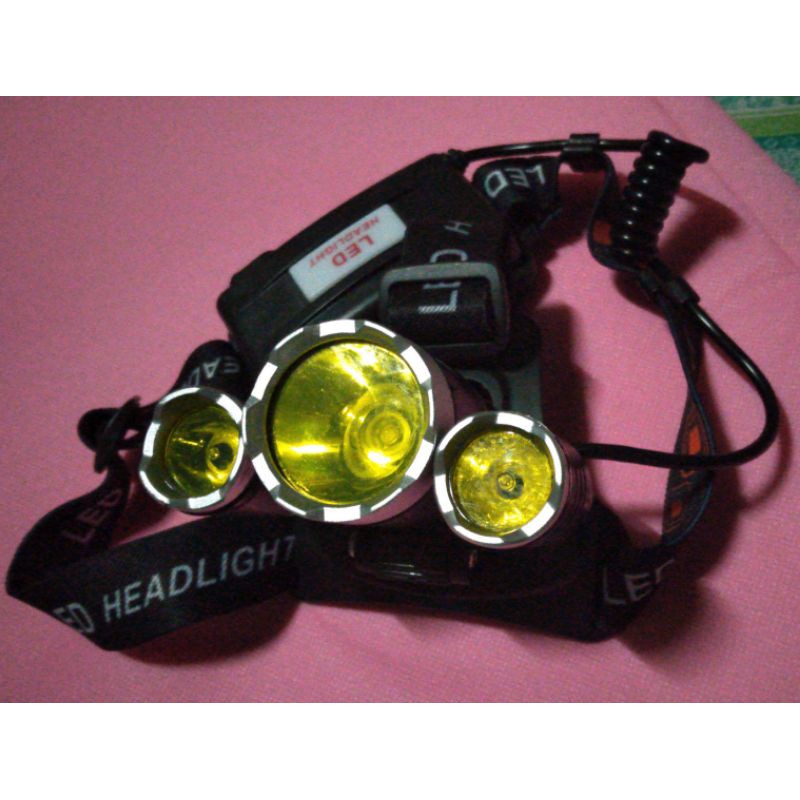 senter kepala. sorot kuning