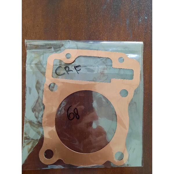PERPAK TEMBAGA CRF 150 UKURAN PISTON 66MM DAN 68MM TEBAL 0.5MM