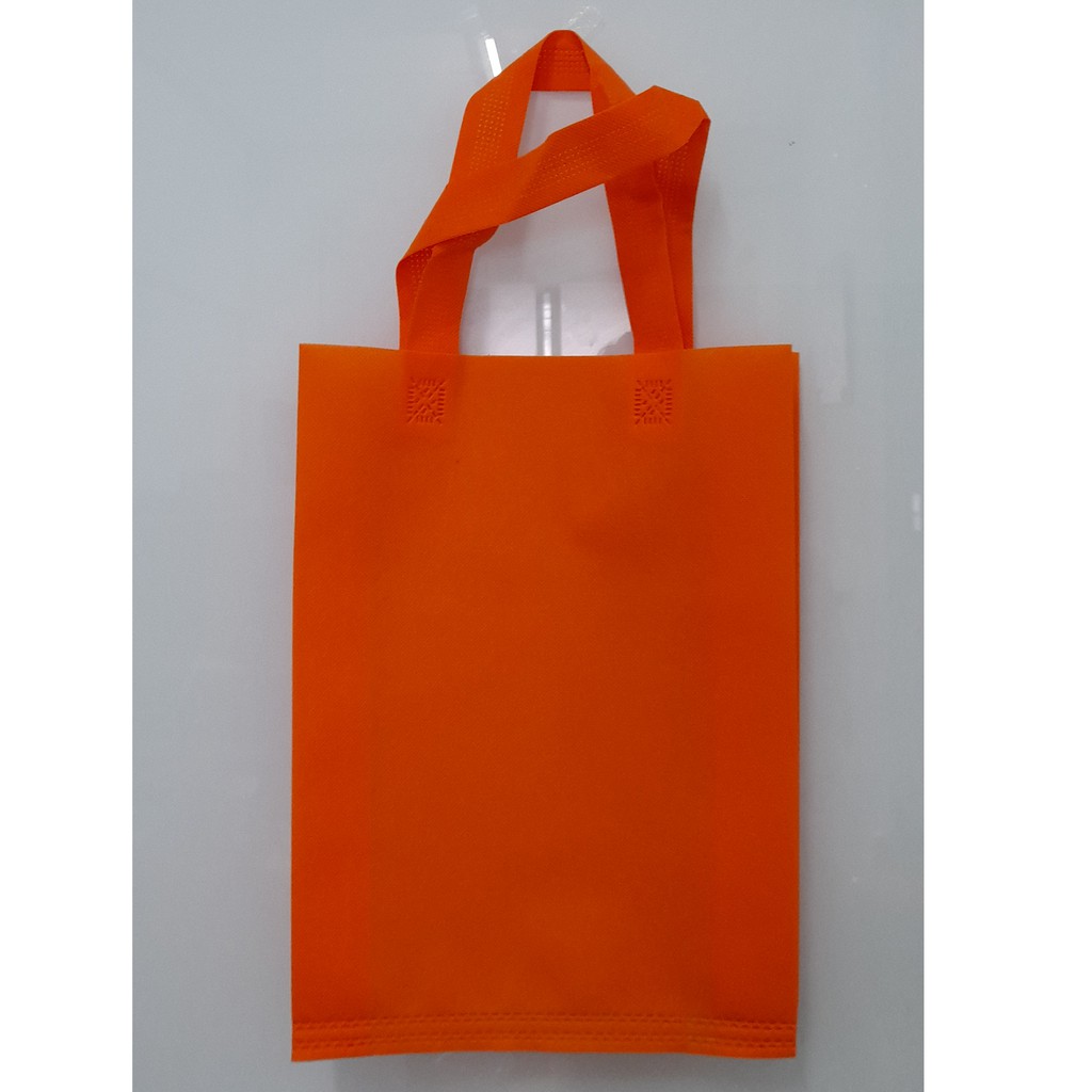 

(Lusin) Tas Press Spunbound Tali Goodie Bag Tas Belanja Warna Orens 30 cm x 40 cm