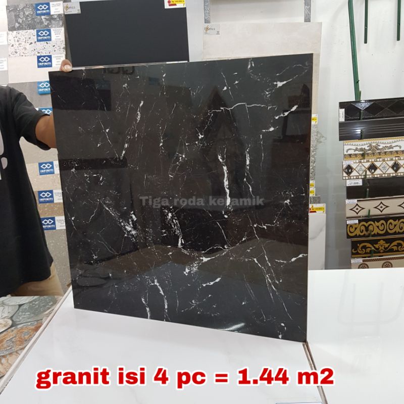 granit lantai 60x60 hitam motif urat putih