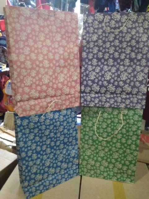 

Paper bag polio batik/kembang terlaris dan murah isi 12 pcs new
