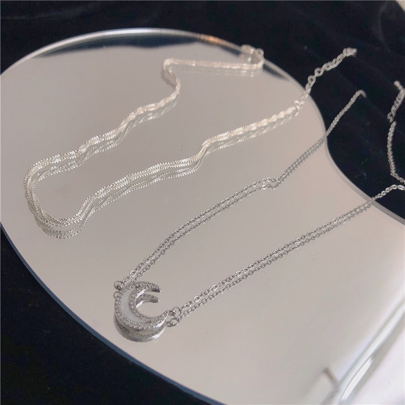 Set Kalung choker Rantai Klavikula Ganda Desain Bulan Kilau Bahan Zirkon