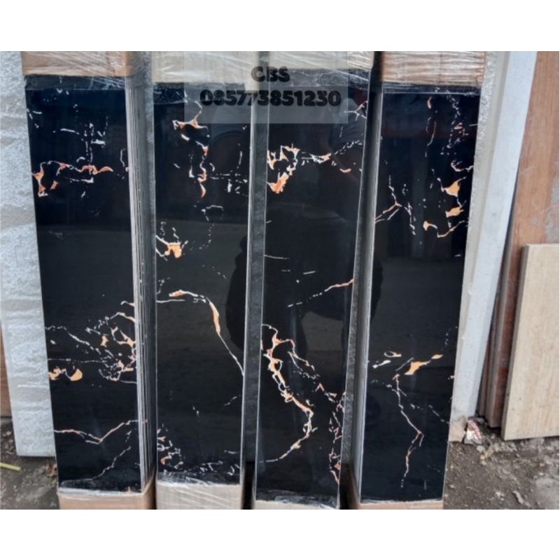 plint granit 10x60 hitam motip emas