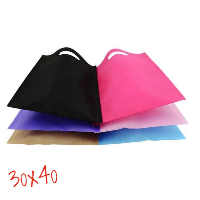 

NEW goodie bag tas spunbond oval 30x40 tas press,dcut ,plong - Random