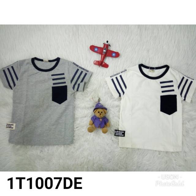 Baju import anak merk uson