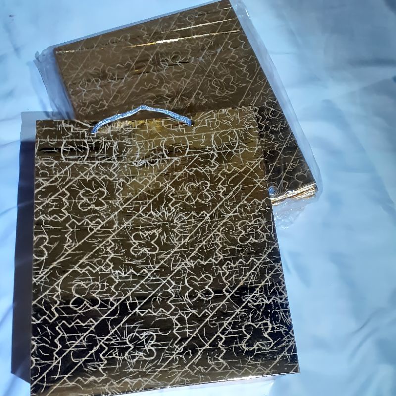 

tas kertas emas