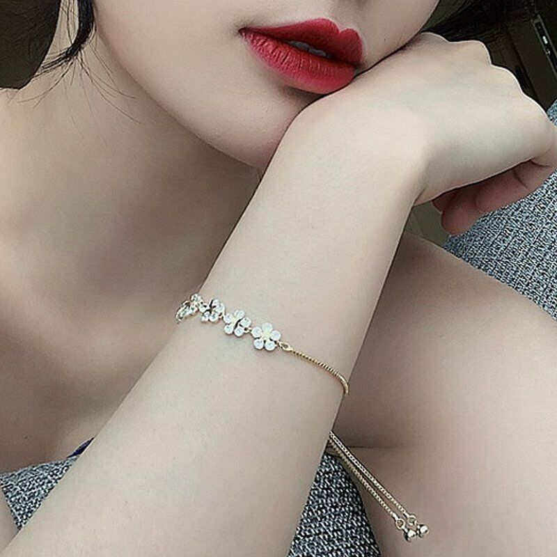 Gelang Tangan Rantai Adjustable Motif Bunga Bintang Aksen Zircon Untuk Perhiasan Wanita