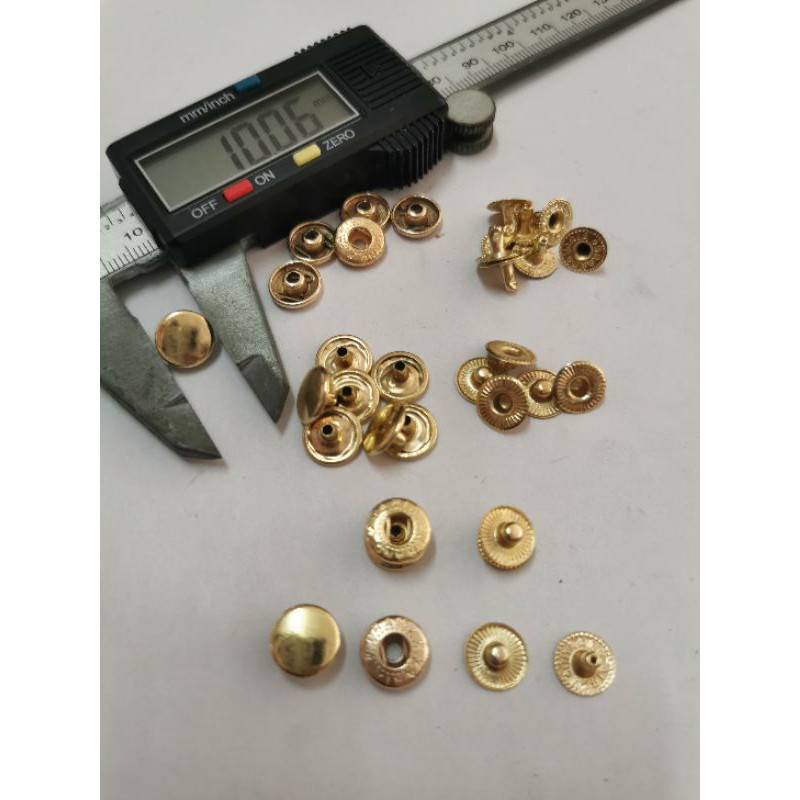 

kancing cetet besi 10mm / kancing cetet 230 gold / 5gross