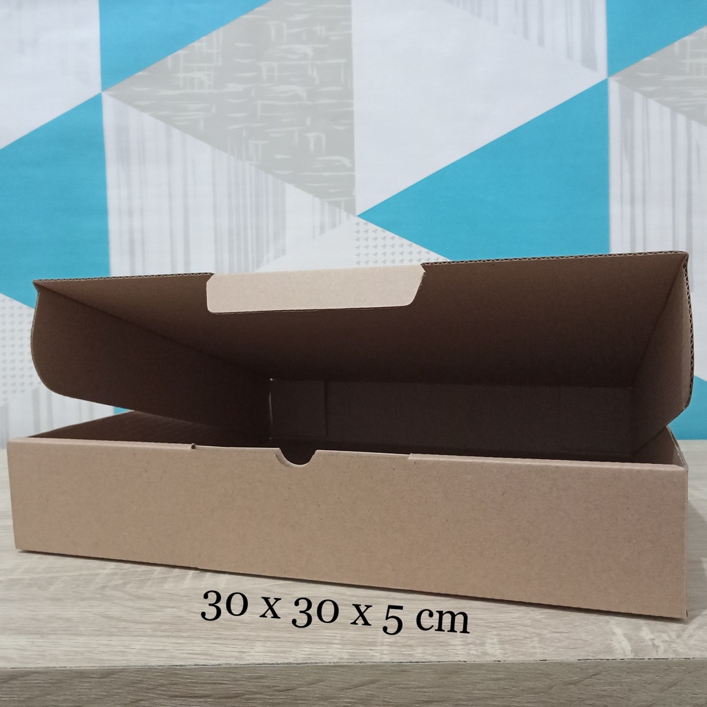 

Kardus 30 x 30 x 5 cm....Die Cut kotak aksesoris dll