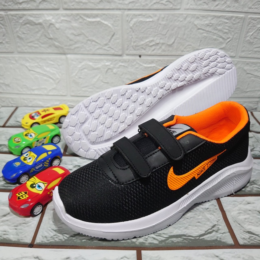 Sepatu Sneakers Sepatu Anak Import zoom Size hitam oranye perekat 26-37 Usia 4-10 Tahun