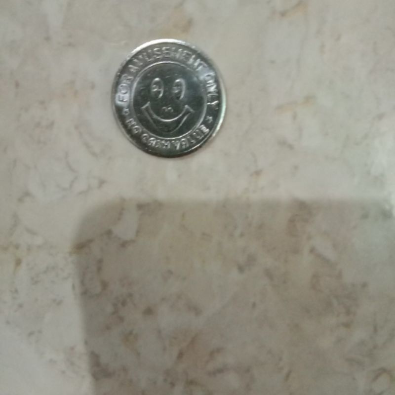 koin badut capit boneka