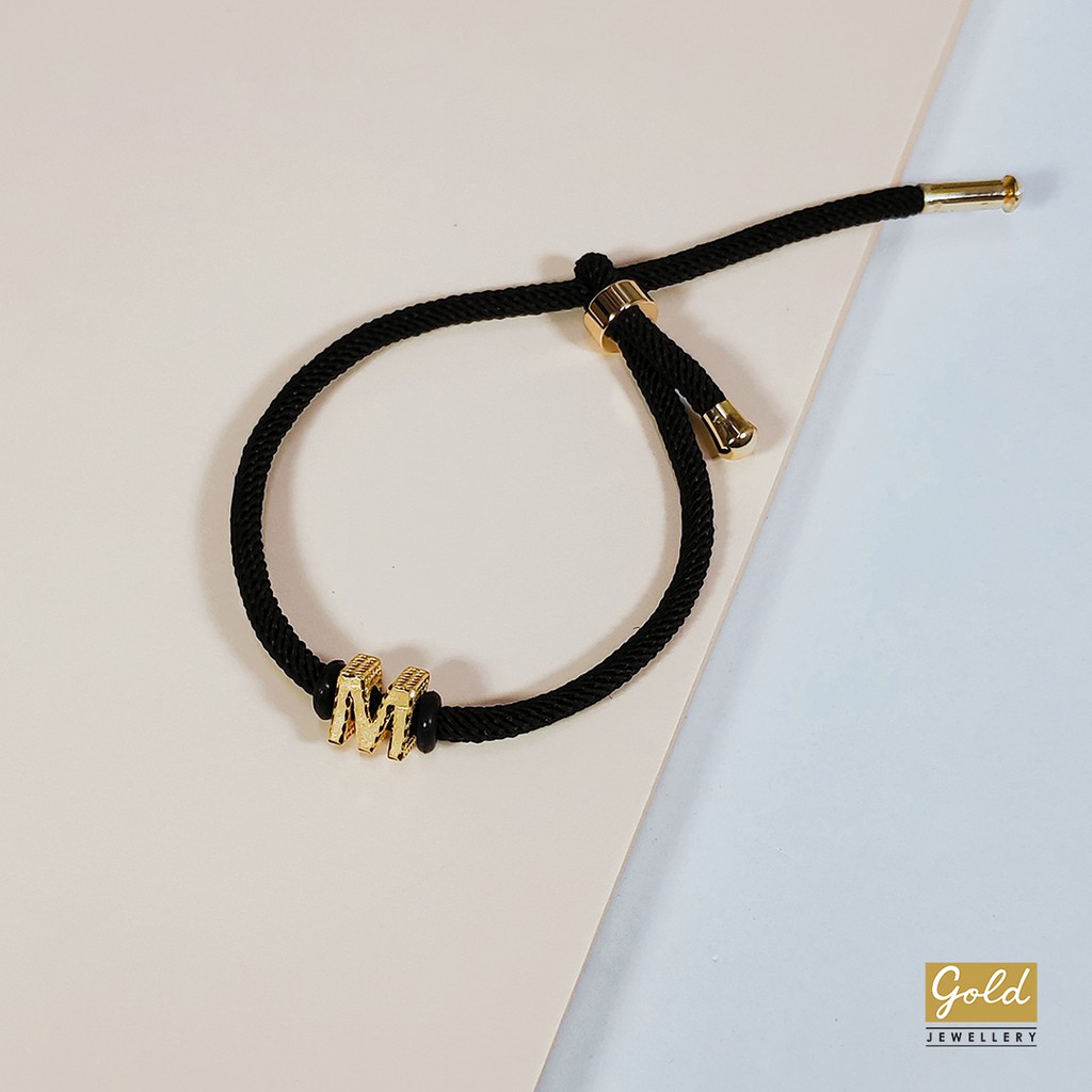 Gelang tali emas kuning kadar 700 70% inisial M bsr tali serut hitam