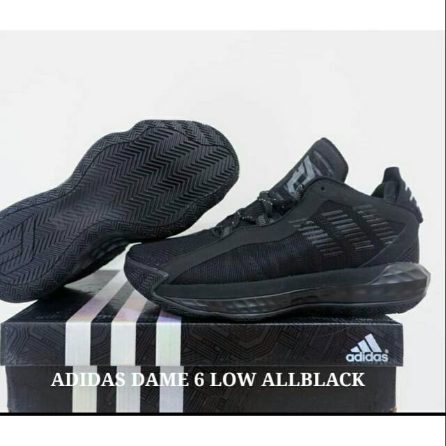 all black low top adidas