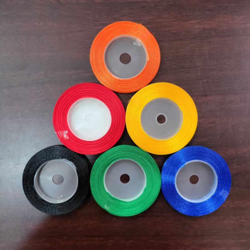 

TALI PITA BUKU SATIN 1 CM (gulungan)