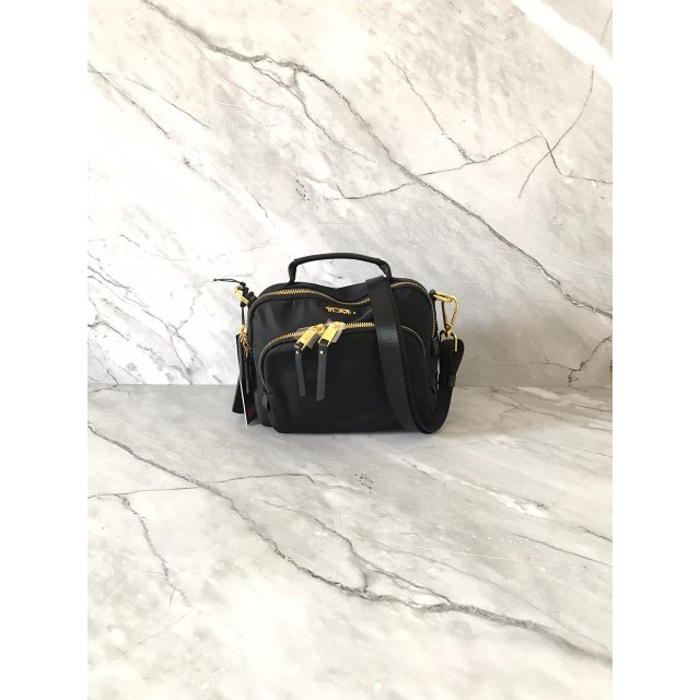 TAS WANITA TUMI UNITED CROSSBODY