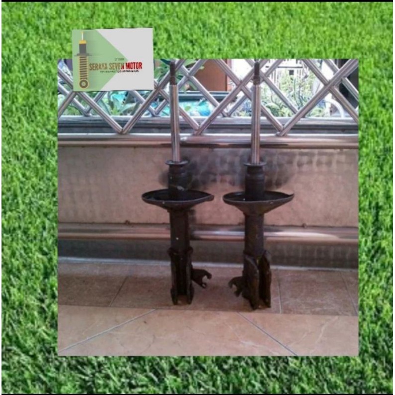 shockbreaker depan mazda 323  elite trendy original garansi