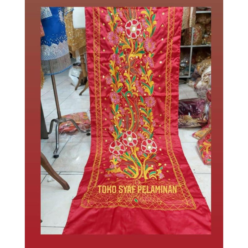 Lansia suji / kain pelaminan suji