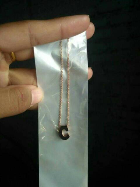 Kalung abjad titanium