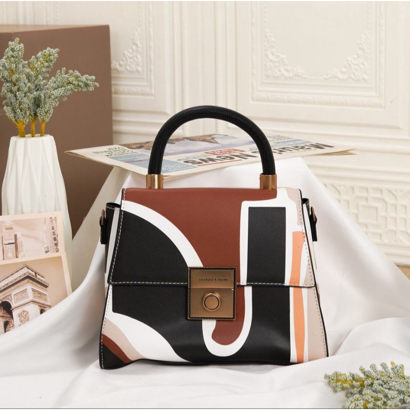 CK PRINTED CROCO TOP HANDLE BAG