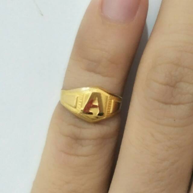 Cincin anak emas asli kadar 700 huruf a