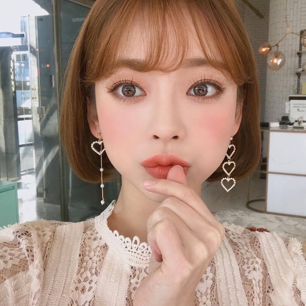 Korea fashion style slim tampan anting-anting perempuan dengan Hati asimetris earbud bermartabat tel