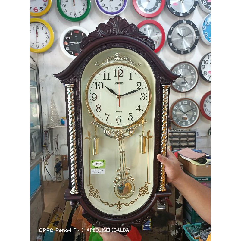 JAM DINDING BANDUL MELODY MERK SAKANA