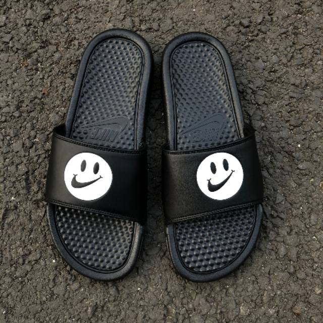 nike slides smiley face