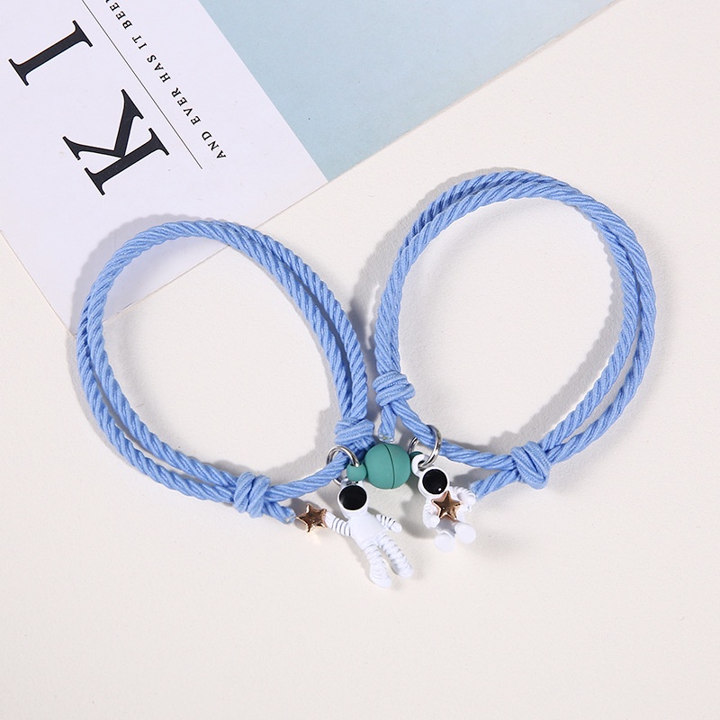 Astronaut magnet attracts small rubber band to send boyfriend couple Bracelet a pair of adjustable hair rope Korean female students