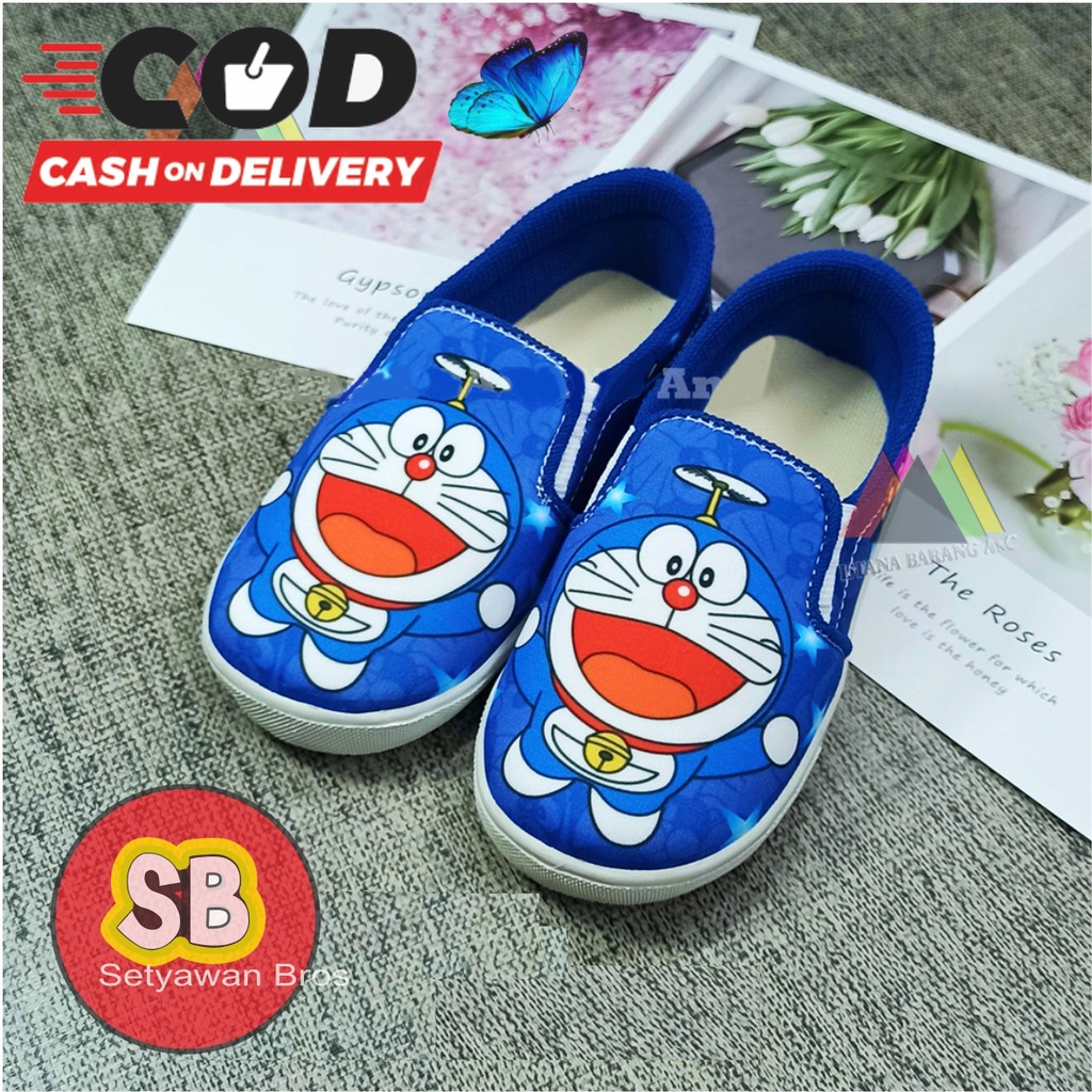 sepatu anak laki laki slip on warna biru / sepatu selop slipon anak perempuan doraemon termurah lucu cod