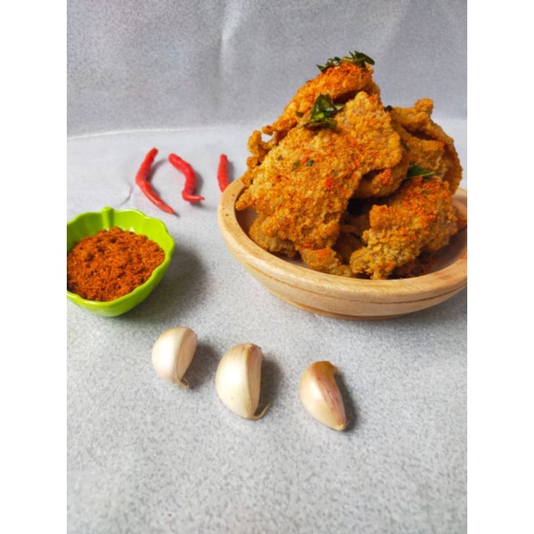 

KULIT AYAM KRISPY PEDAS DAN ORI DAUN JERUK 150gram /kulit ayam /krispy /makanan /cemilan /kulit