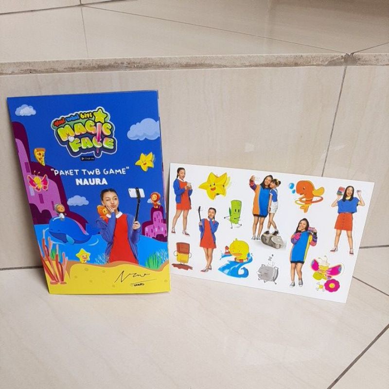 buku menempel magic face tini wini biti