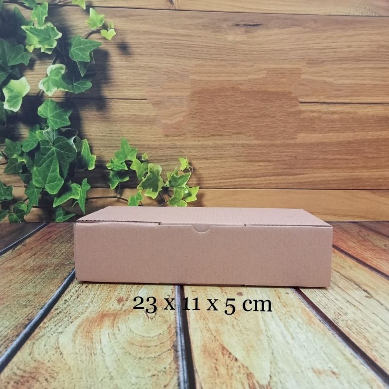 

kardus/box 23x11x5cm...die cut
