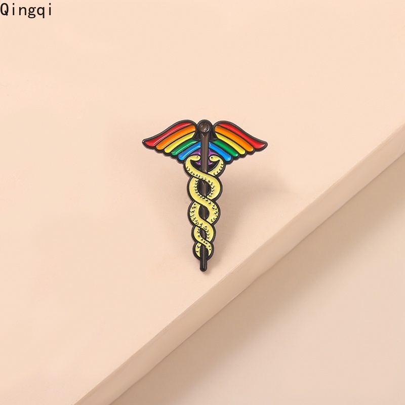 Bros Pin Enamel Bentuk Kartun Ular Dengan Sayap Warna Pelangi Bahan Alloy Untuk Hadiah