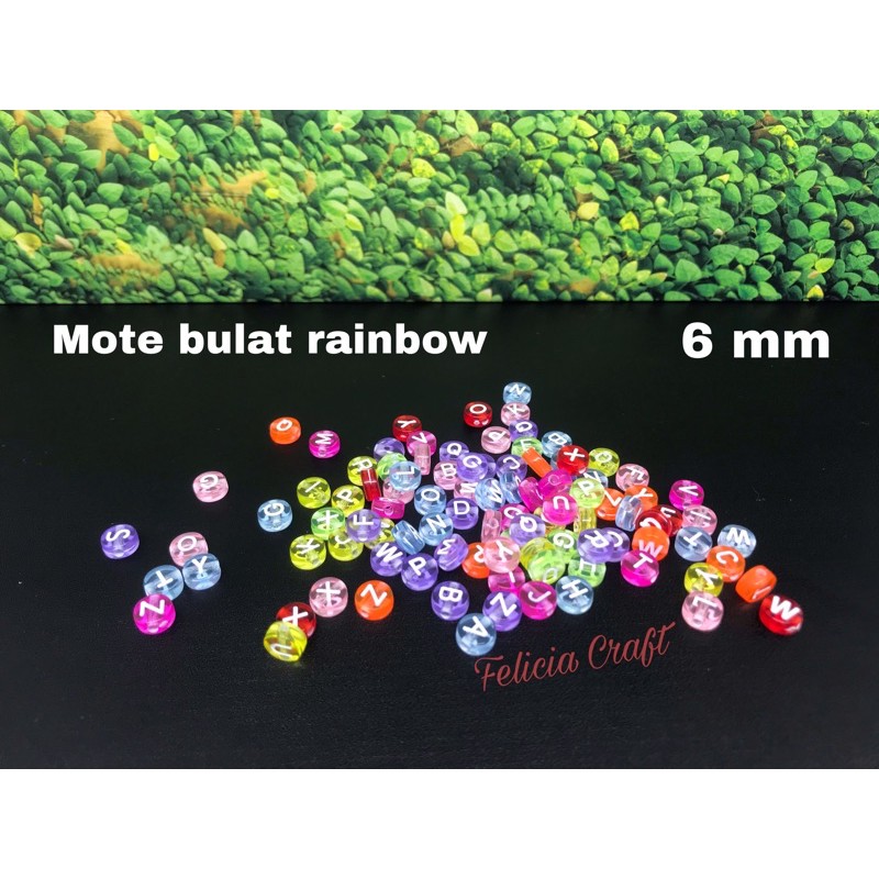 20gram. [+/-160pcs] mote manik huruf bulat transparan rainbow