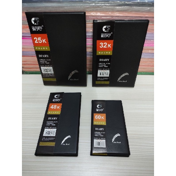 Buku agenda kulit hitam polos