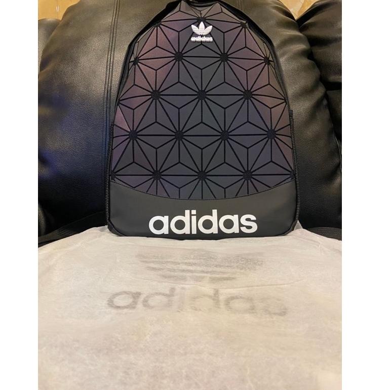 BACKPACK ISSEY MIYAKE / TAS RANSEL BACKPACK ISSEY MIYAKE REFLECTIVE GREY MAROON NAVY S69M