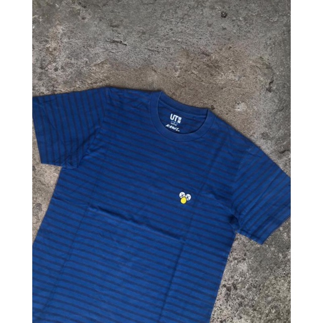 Kaos modern guns & uniqlo x kaws