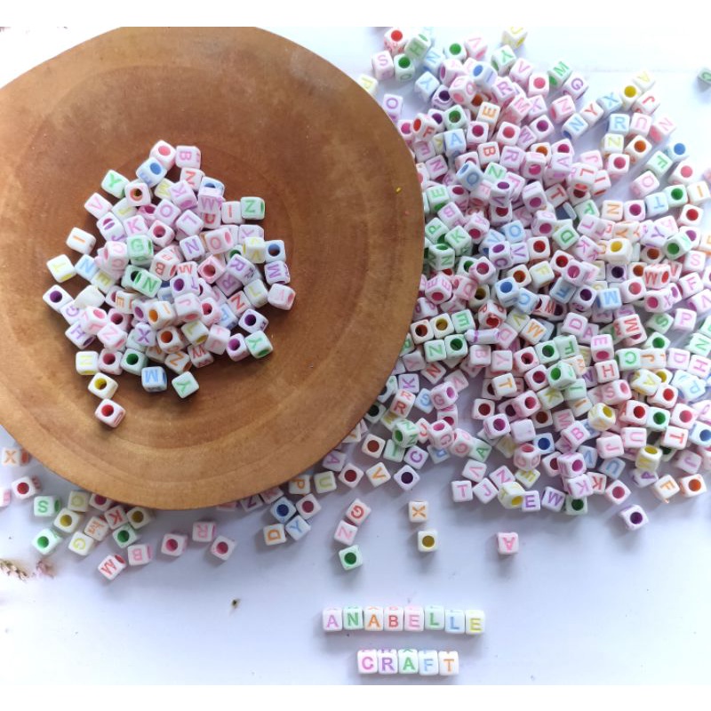 Aneka mote huruf vokal per pcs