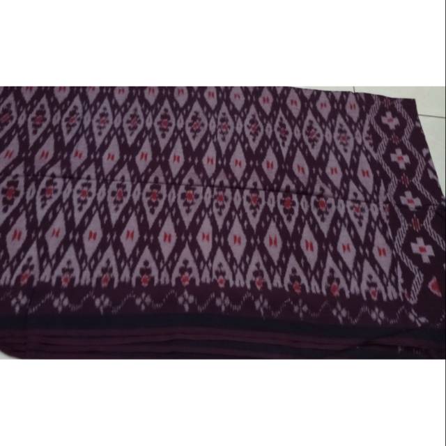 Sarung goyor sutera terbang