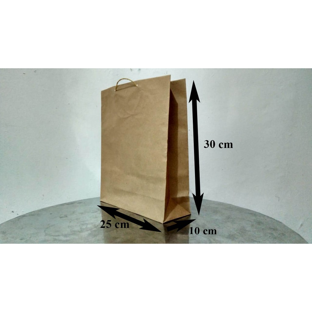 

Paperbag / shopping bag / tas kertas polos - 25 x 10 x 30 - Potrait