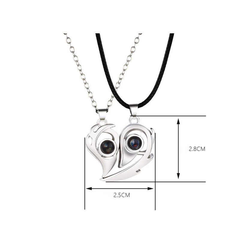 2pcs / Set Kalung Liontin Hati Proyeksi I Love You 100 Bahasa Magnetik Untuk Pasangan