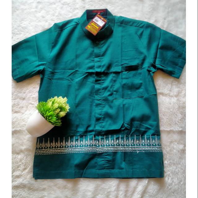 Baju Koko dannis dewasa