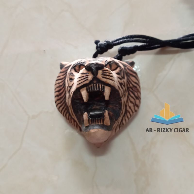 Kalung ukir macan kayu kaboa sancang