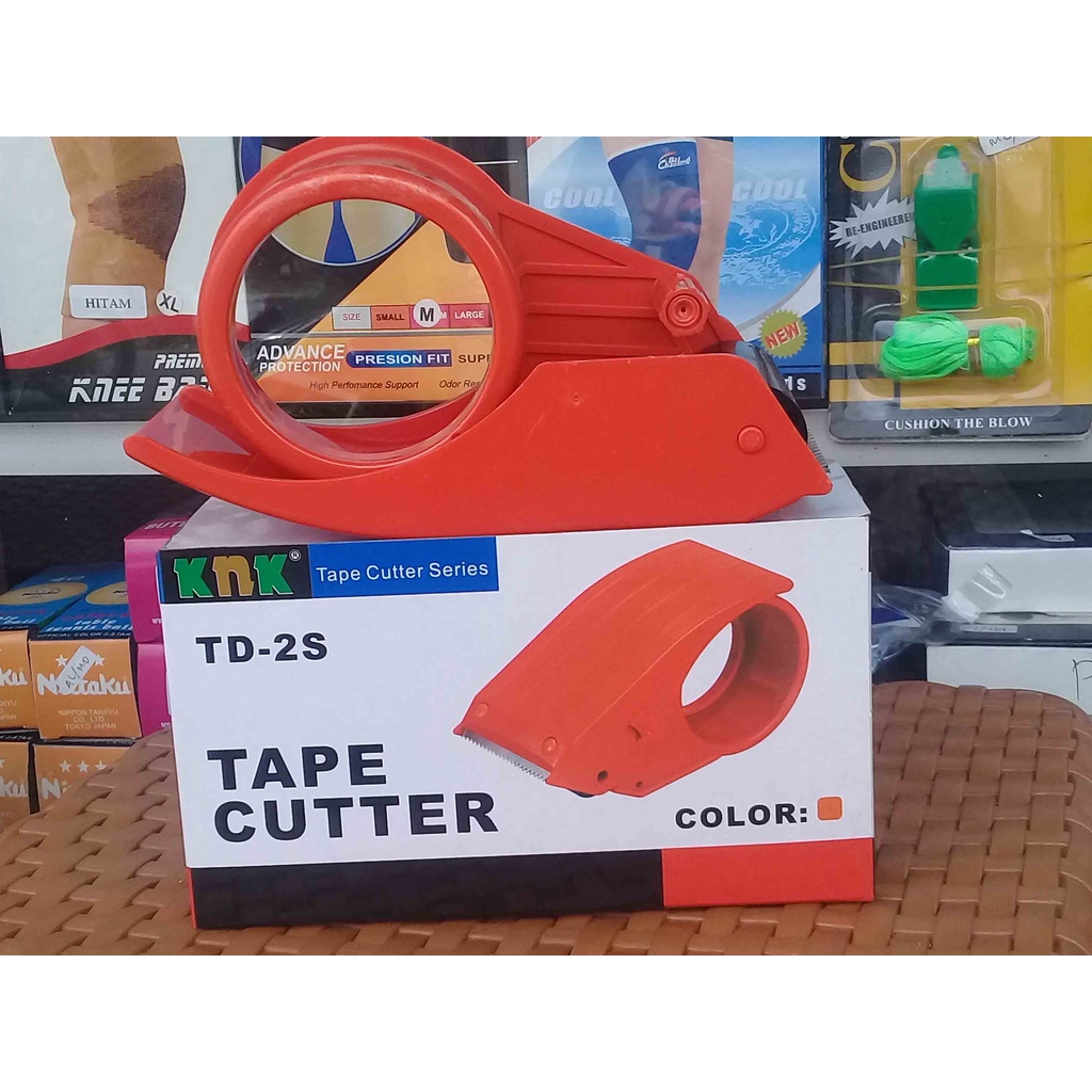 

tape dispenser/pemotong kertas