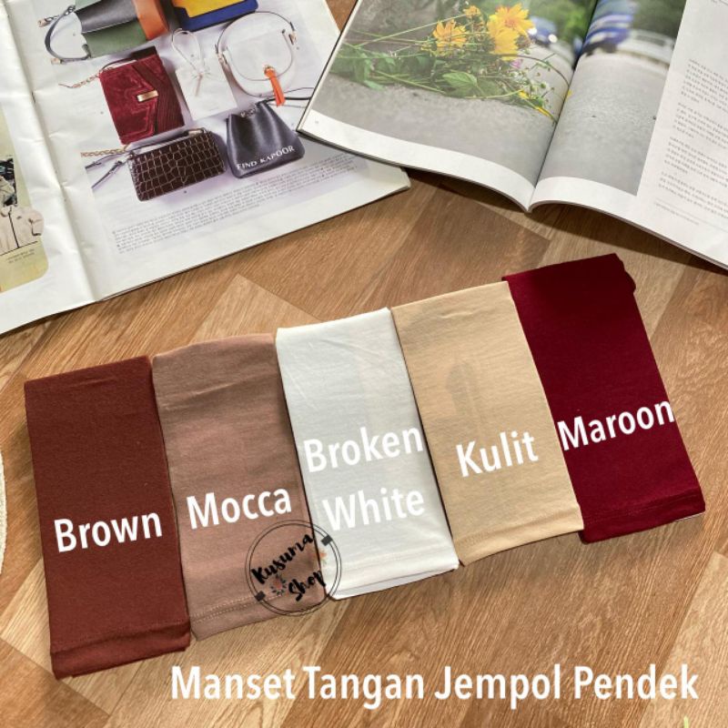 Manset tangan jempol pendèk bahan kaos pe